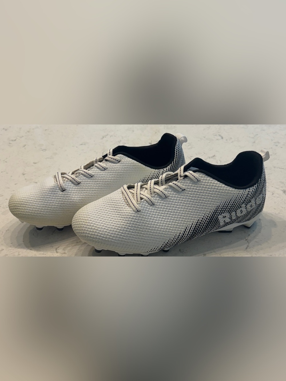Youth White Soccer Cleats with Black Trim